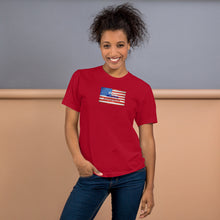 Load image into Gallery viewer, Show your patriotic pride with this soft, fitted &quot;God Bless America&quot; flag tee. Available in black, navy, red, white, and baby blue. 
